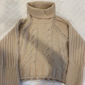 Cropped, oversized knit sweater